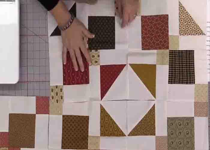 Assembling the 9-patch madness quilt top