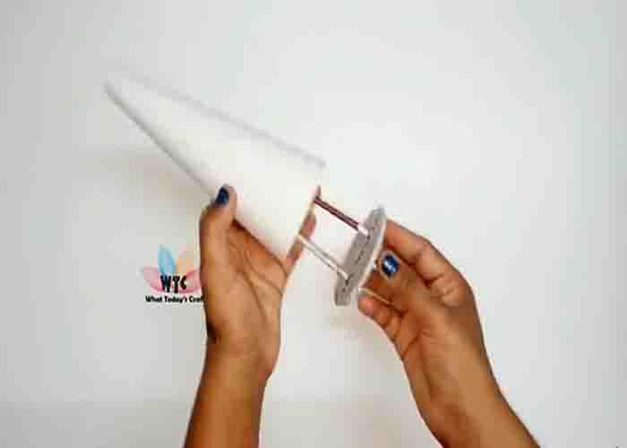Making the body of the newspaper doll candle holder
