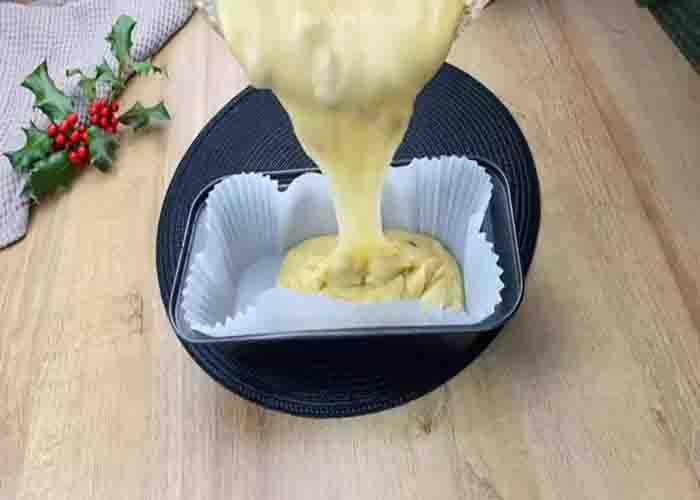Adding the batter to the loaf pan