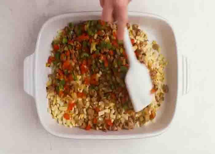 Assembling the hashbrown breakfast casserole
