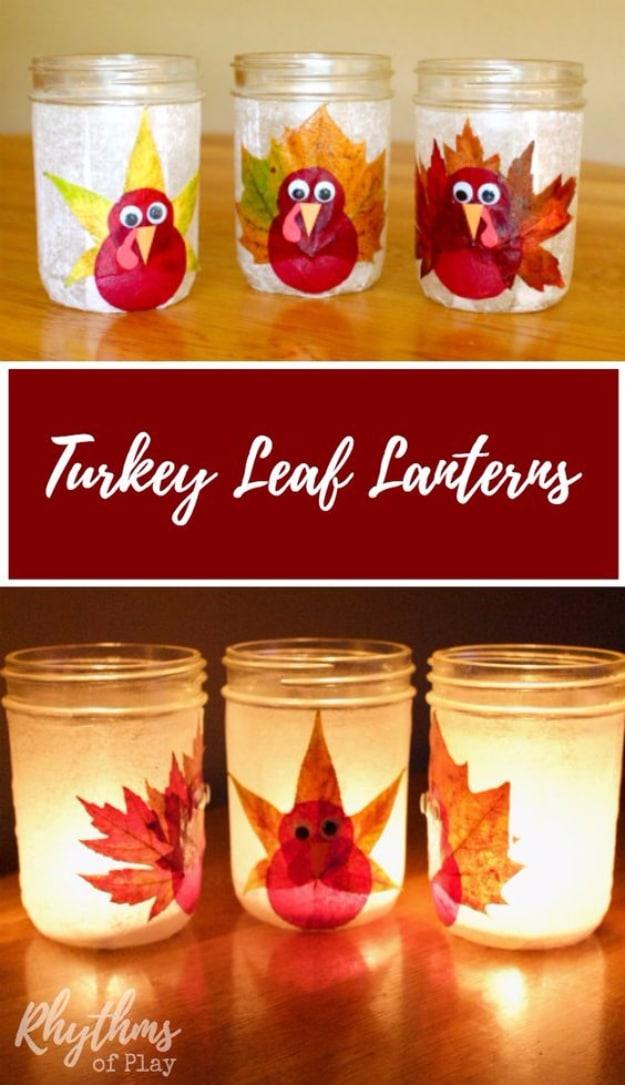Turkey leaf lanterns made from glass mason jars covered in real fall leaves with a turkey face glowing from inside
