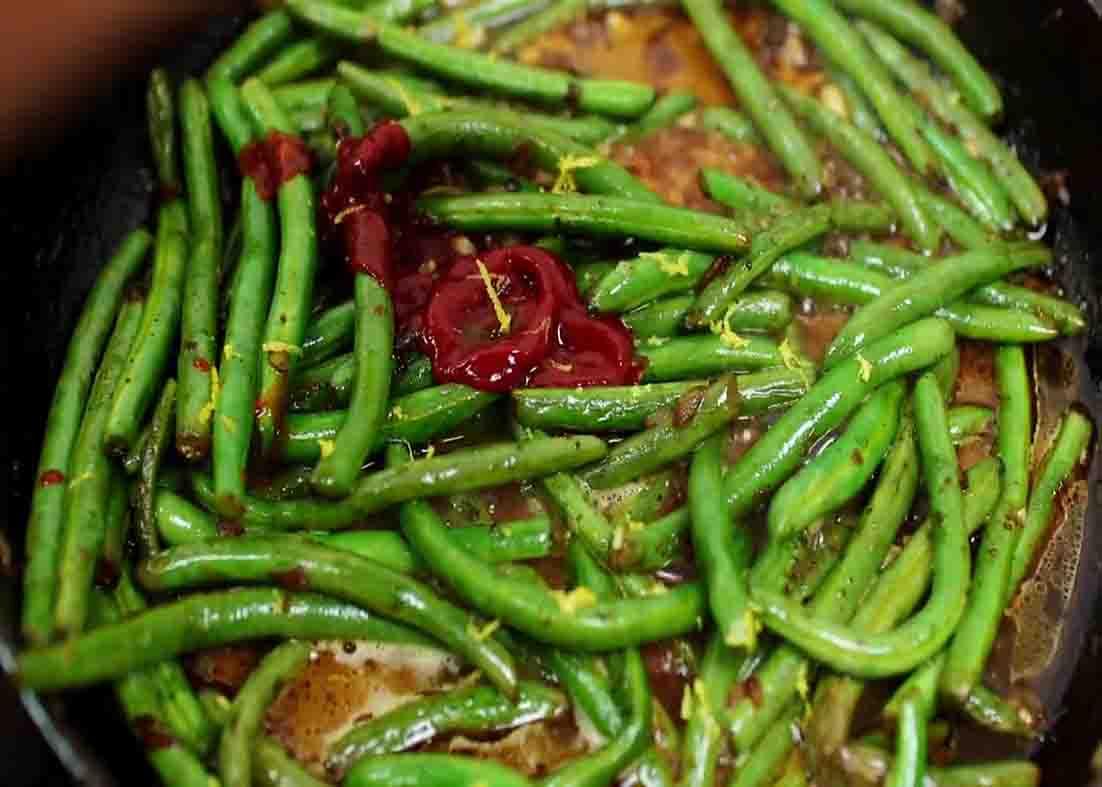 Cooking the green beans for the one-pan chicken and veggies recipe