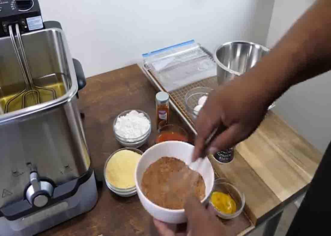 Mixing all the spices for the southern fried catfish