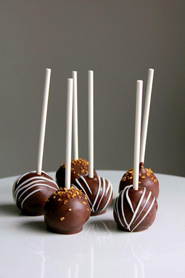 Triple chocolate cake pops dipped and drizzled in chocolate for a rich bite sized party dessert, a rich party treat