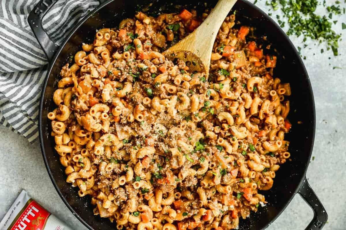 One pan ground beef pasta simmered together for an easy weeknight dinner with minimal cleanup for the whole family