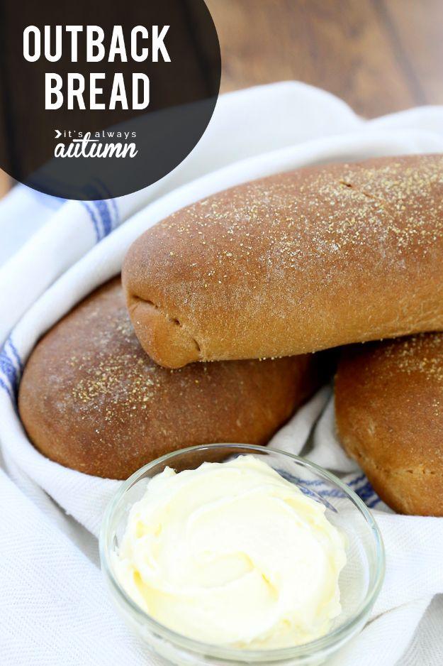 Outback copycat sweet brown molasses bread loaves rolled in cornmeal with a dark crust, served sliced
