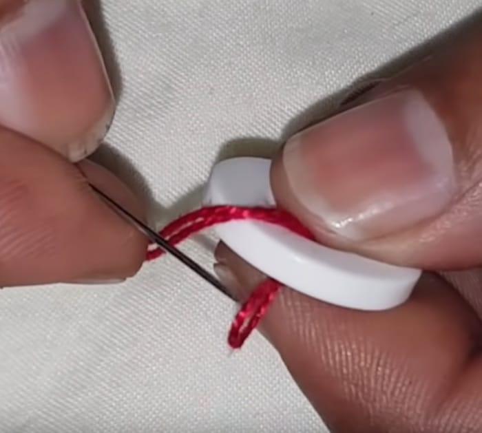 Make hand embroidered buttons.