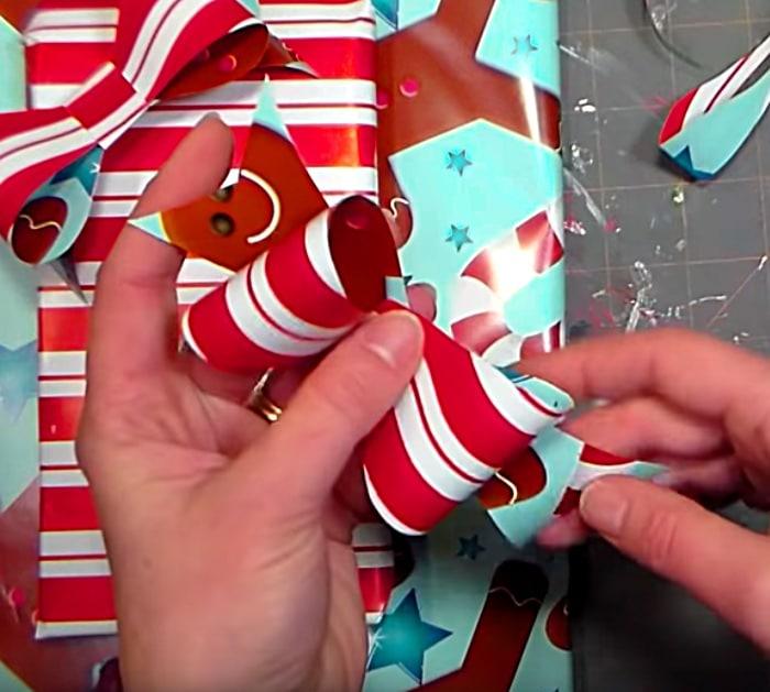Learn to make a cheap quick easy DIY Wrapping Paper Bow