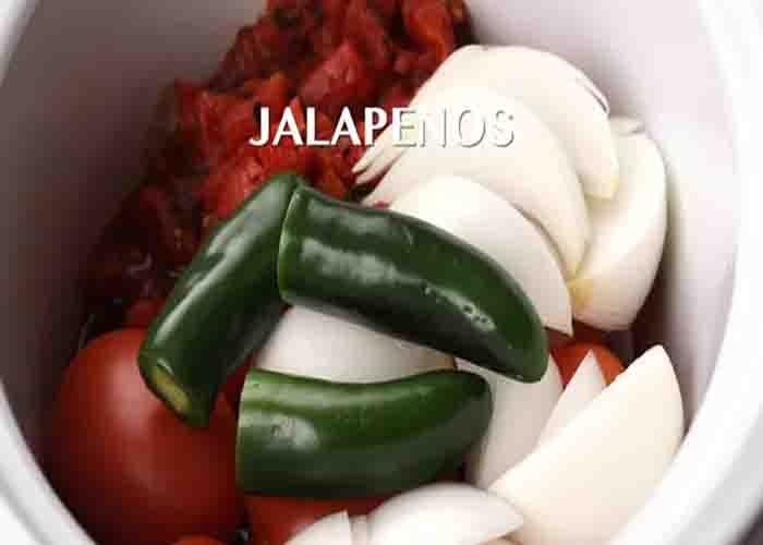 Adding the salsa ingredients in the slow cooker