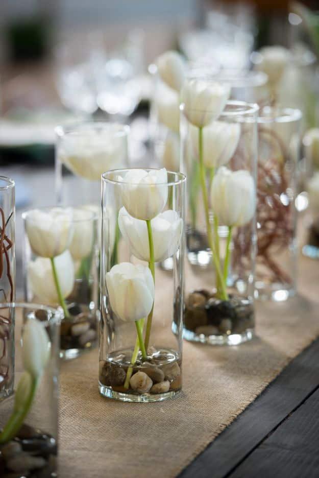 Tulips In Glass Vases, a diy wedding centerpiece idea, great for matching decor exactly to a wedding color scheme