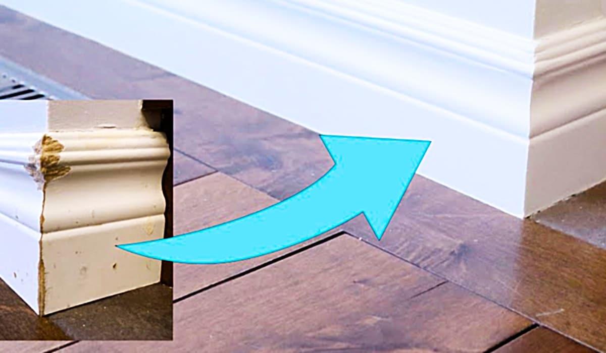 How to repair and paint baseboards, a white baseboard along a painted wall with a brush and taped edge mid paint