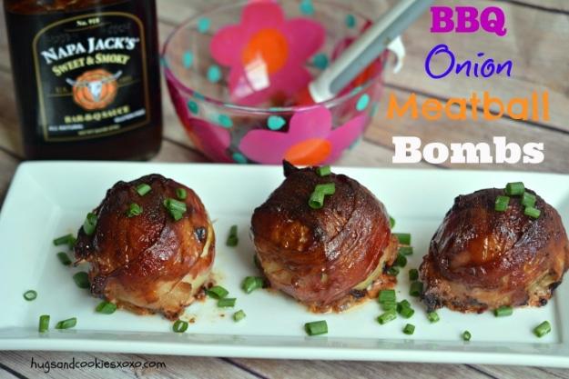 BBQ onion meatball bombs wrapped in bacon and glazed with barbecue sauce, topped with chives ready for the grill