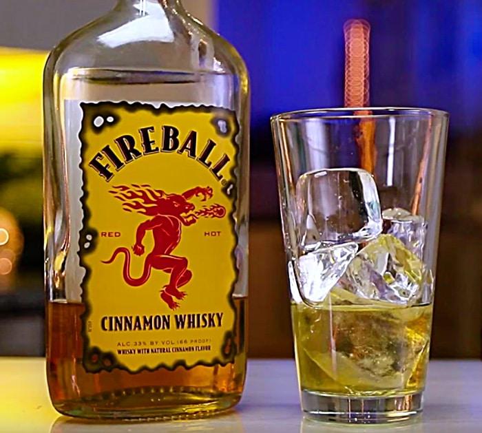 Learn to make a Hot Lil Honey Shot with Frangelica Liquor and Fireball and Jack Daniels