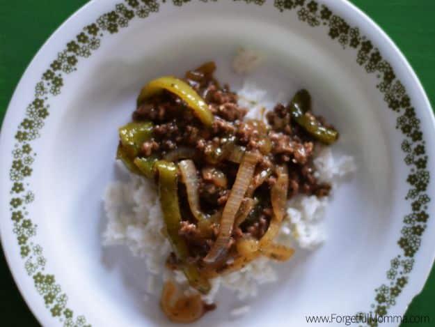 Asian ground beef with three cups of chopped bell peppers and sliced onion in a thickened soy sauce glaze