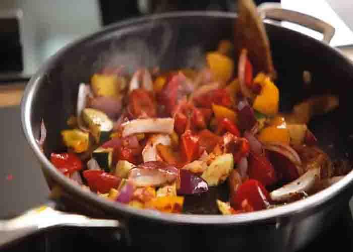 Stir-frying the veggies for the vegetable pasta bake recipe