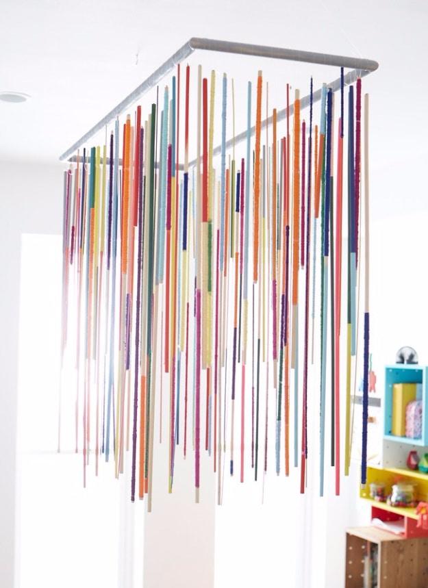 Dowel Rod Chandelier DIY, a creative DIY chandelier worth making for the home and a favorite pick from this roundup
