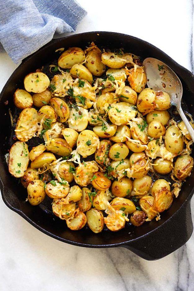 Italian roasted baby potatoes in a cast iron skillet with parmesan cheese, parsley and Italian seasoning