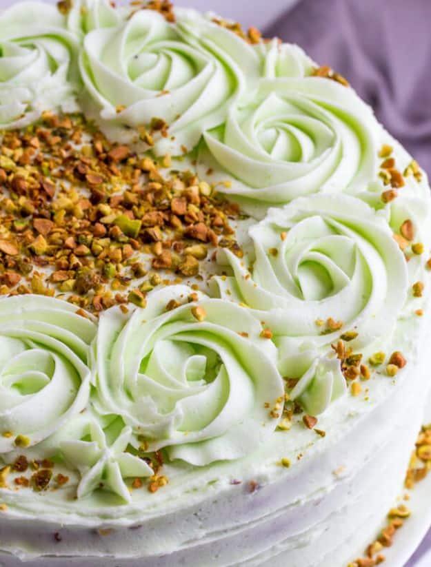 Vanilla bean cake with natural pistachio buttercream and chopped pistachios pressed into the sides recipe for a celebration