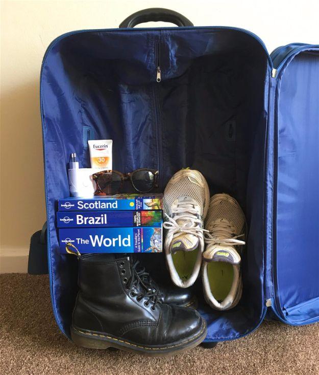 Packing Tips for Travel - Pack Heavy Items At The Bottom Of The Suitcase - Easy Ideas for Packing a Suitcase To Maximize Space - Tricks and Hacks for Folding Clothes, Storing Toile