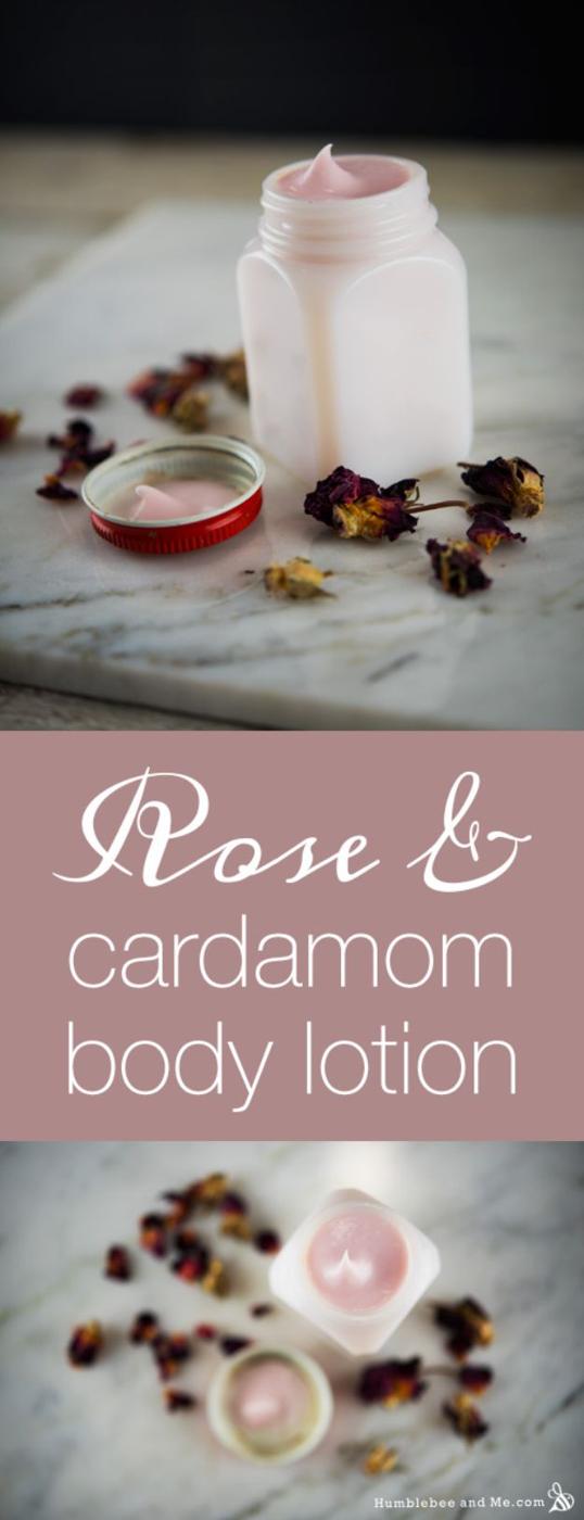 Rose cardamom body lotion in a frosted glass jar on white marble with dried rose buds and a red metal lid