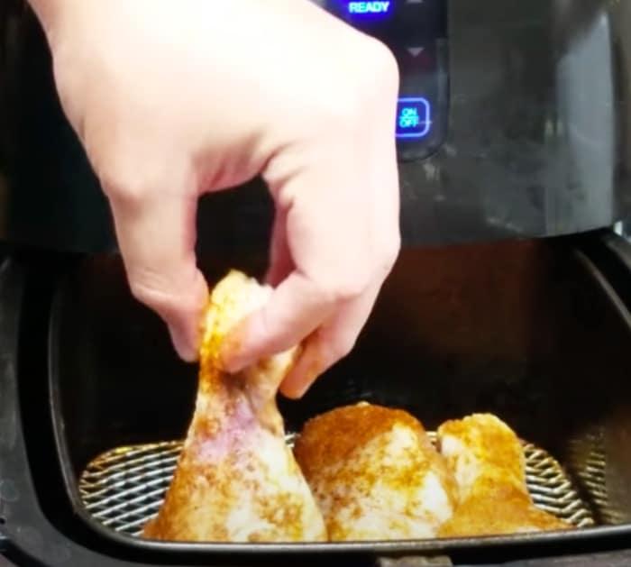 Place Seasoned Chicken In An Air Fryer To Make BBQ Chicken