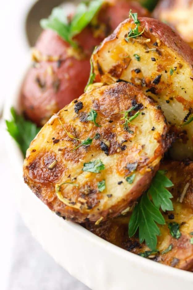 Lemon parmesan garlic roasted red potatoes, halved and golden on the cut side, tossed with fresh parsley