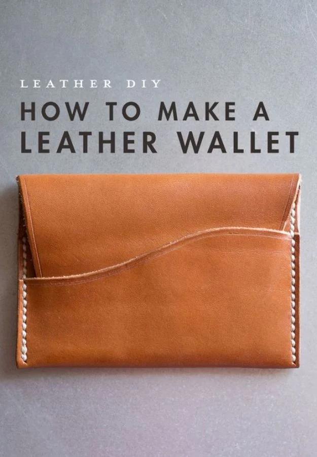 Make a leather wallet, a tan vegetable tanned leather card wallet with white saddle stitching on gray concrete