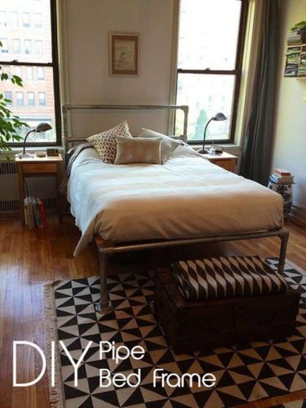 DIY pipe bed frame graphic with a galvanized pipe bed made up in white bedding in a city apartment room