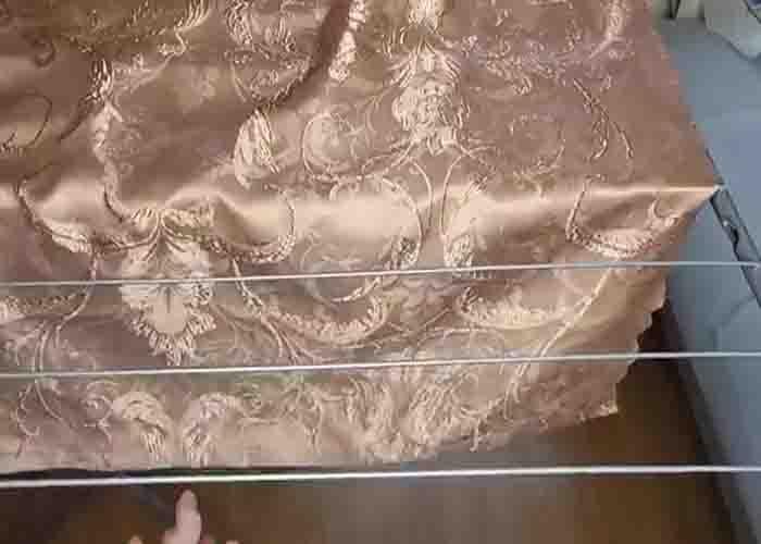 Pinning the curtain before cutting it to shorten it