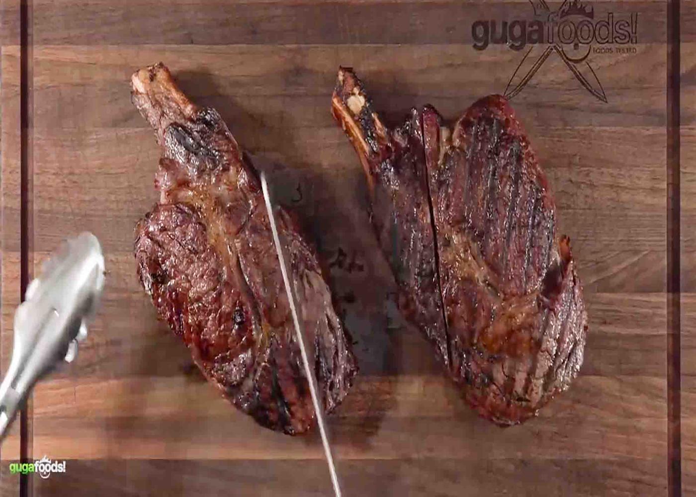 Slicing the steak that has been whiskey-aged for 24 hours