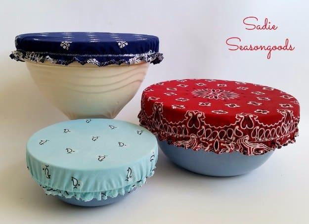 Vintage bandana bowl covers, three mixing bowls topped with elasticated navy red and mint bandana fabric covers