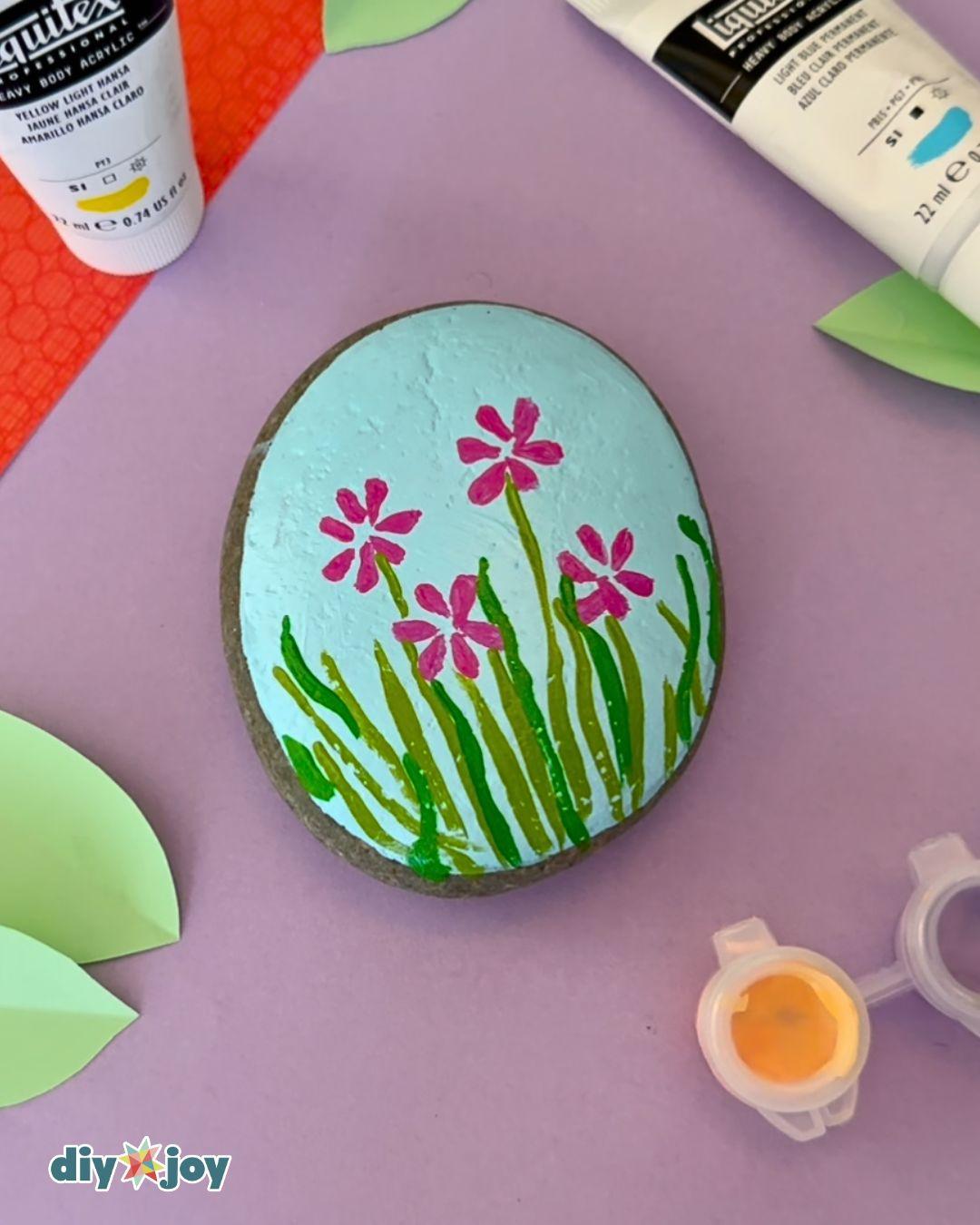Flowers On Rocks — painted stones for garden