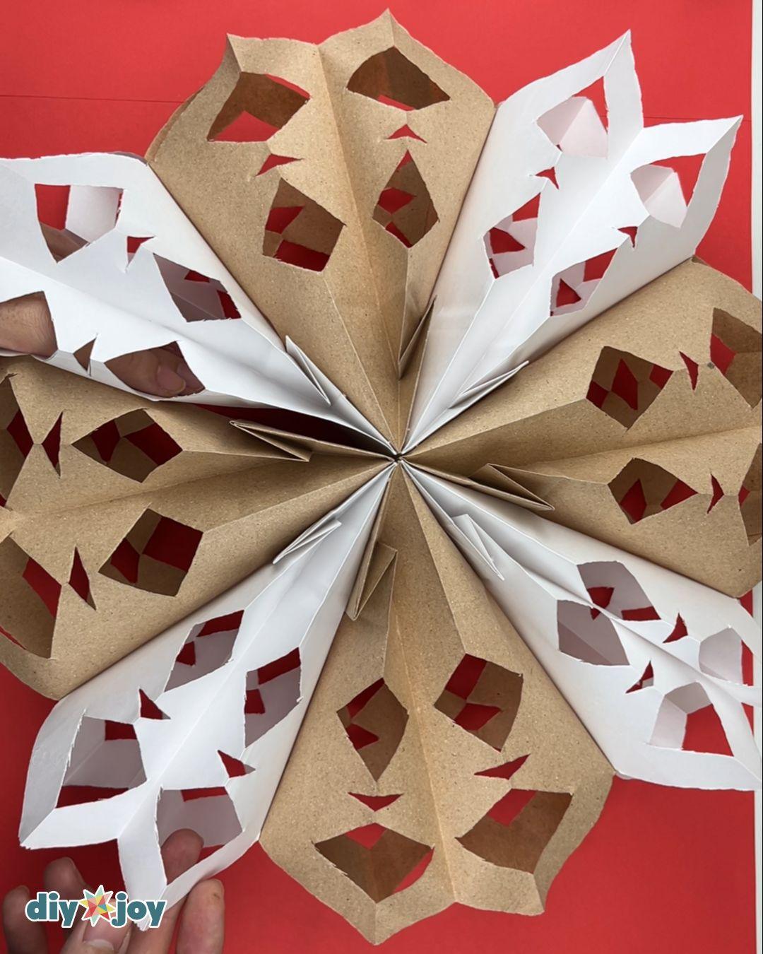Easy Snowflake Paper Bags — gluing the ends
