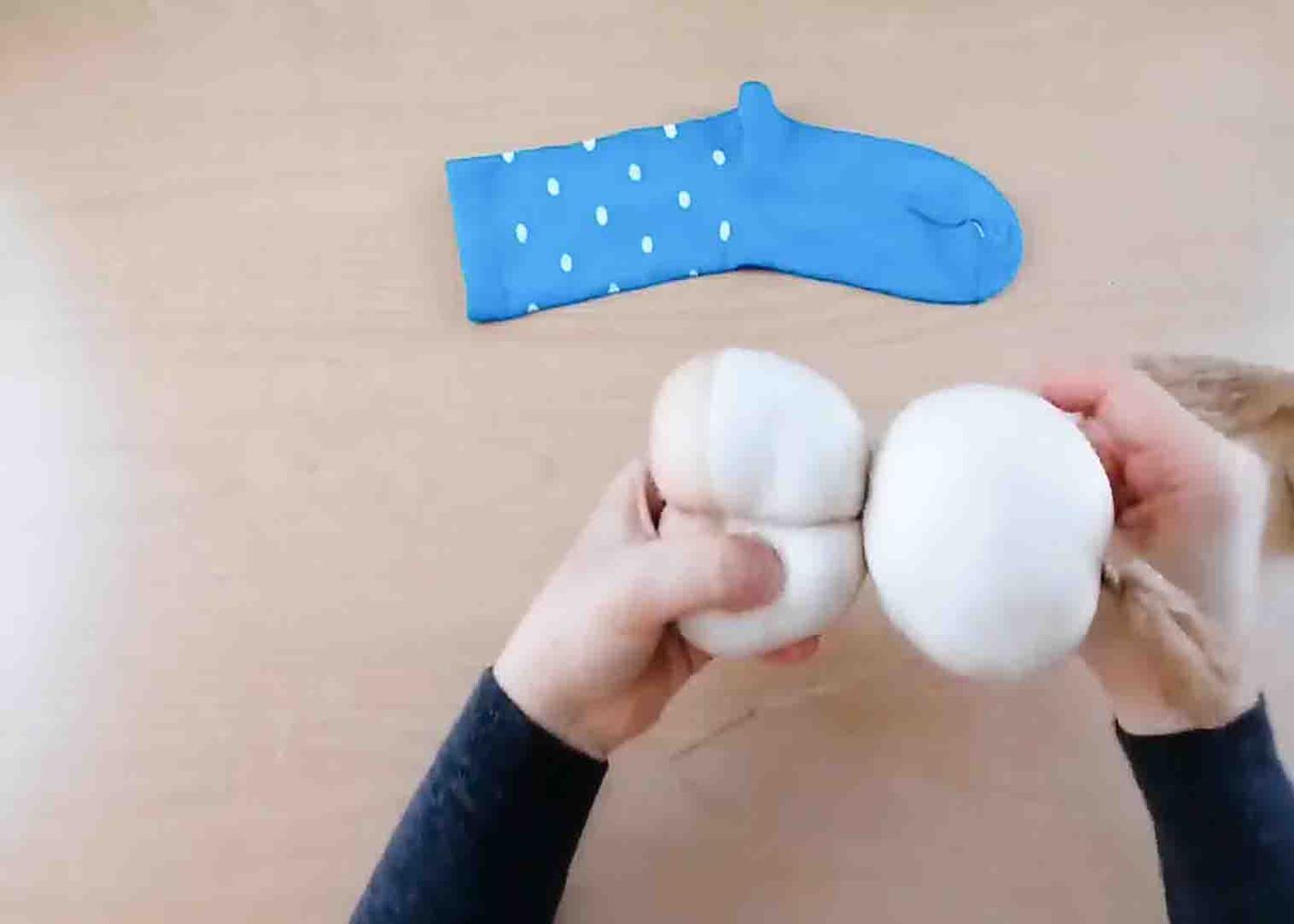 Making the legs of the sock doll