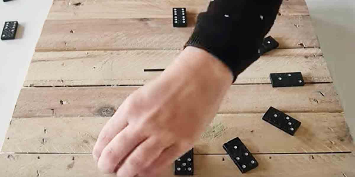 He Strategically Places Dominos On A Pallet Wood Square And Creates A Clever Item!