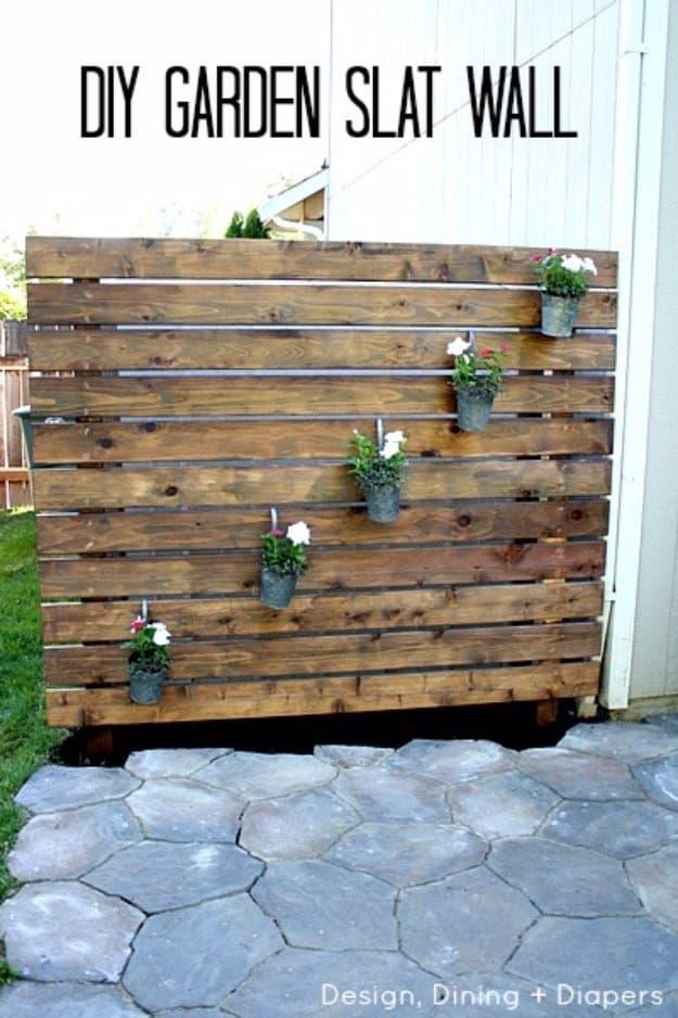 DIY Garden Slat Wall for your Patio, a pretty DIY patio decor idea for outdoor living and a charming accent for a front porch