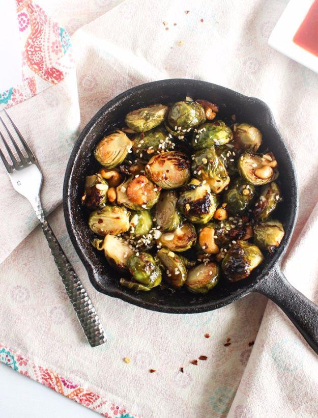 Sweet chili brussels sprouts roasted crisp in a cast iron skillet and tossed in homemade Thai chili sauce