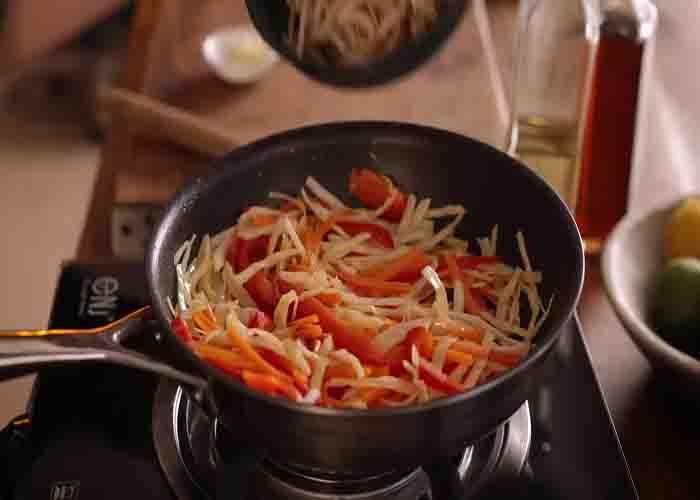 Cooking the veggie filling for the spring rolls recipe