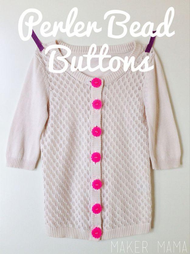 Perler bead buttons, a cream knitted cardigan fastened with a row of round hot pink fused bead buttons