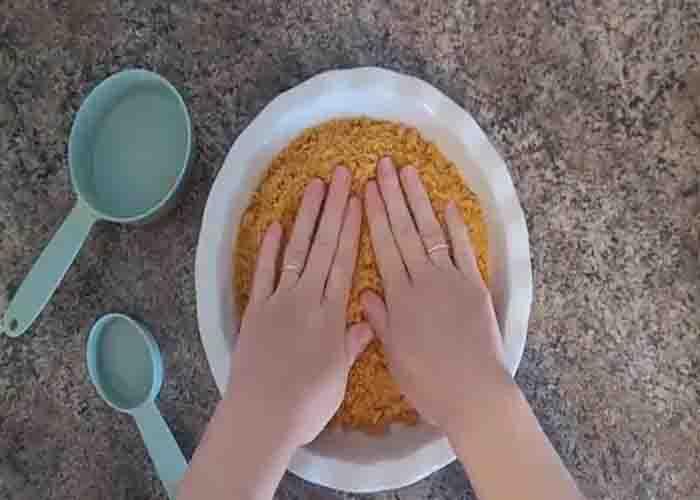 Making the crust of no-bake pineapple pie