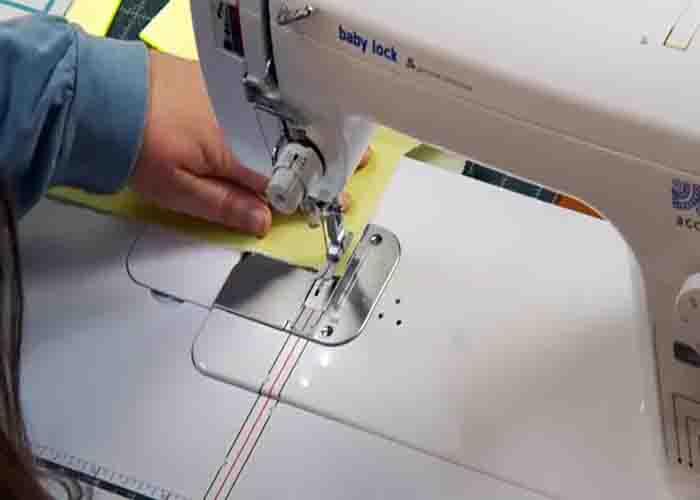 Sewing the two squares together for the chevron quilt