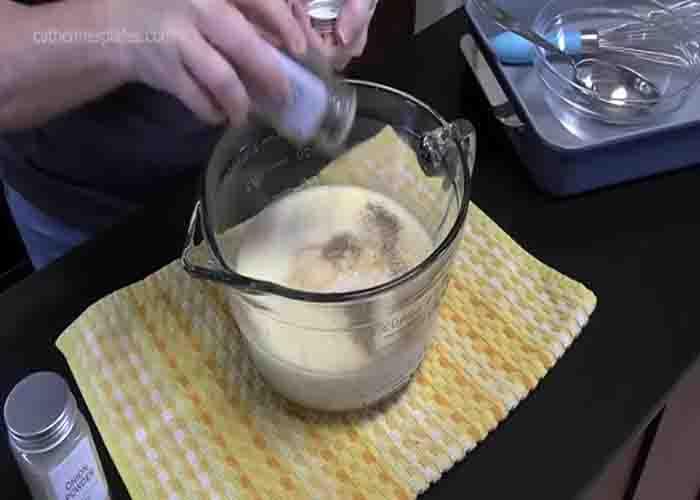 Making the soup mixture for the pork chops and rice casserole
