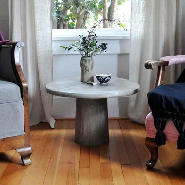 DIY Concrete Pedestal Coffee Table, an inexpensive project that still looks high end when finished and worth a look
