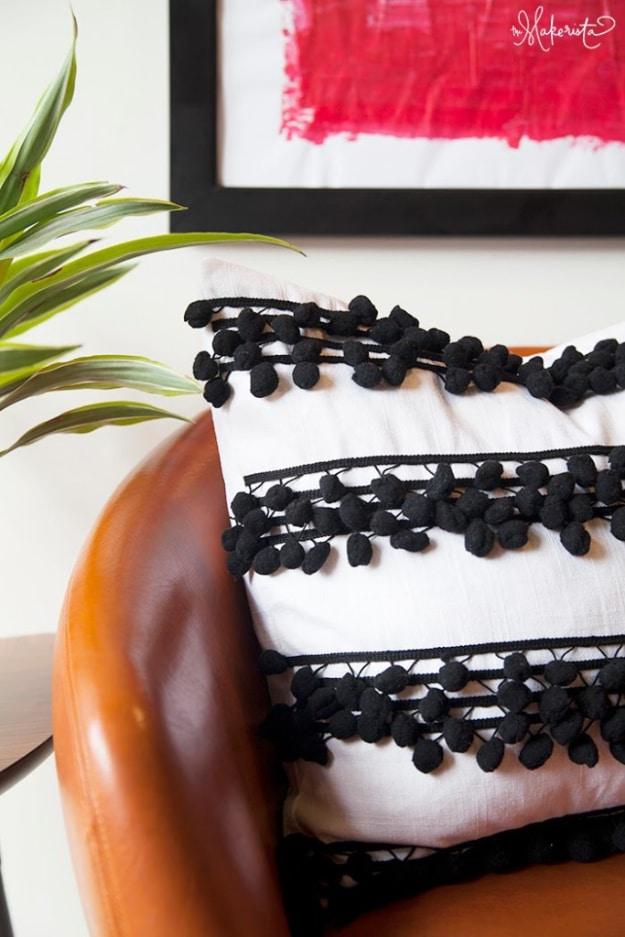 Pillowcase DIY with Striped Pompom Trim, one of the best pillowcase projects on this list and an idea worth saving for later