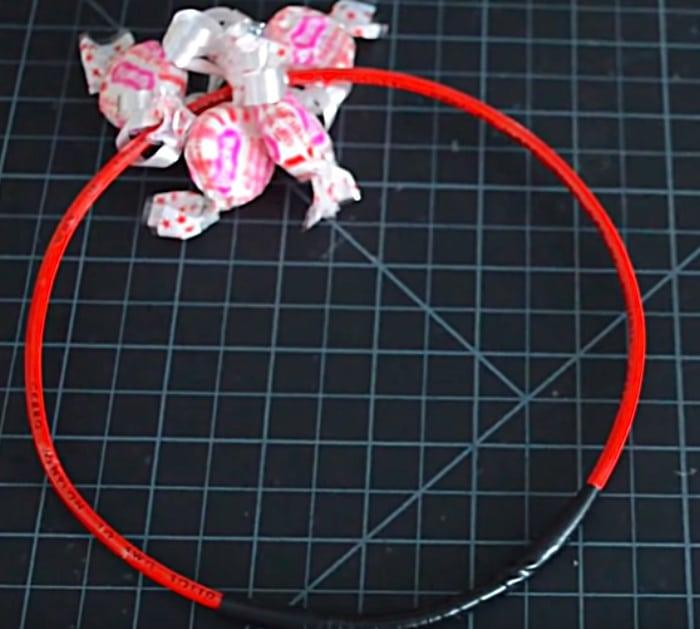 Learn to make a cheap candy wreath for Christmas