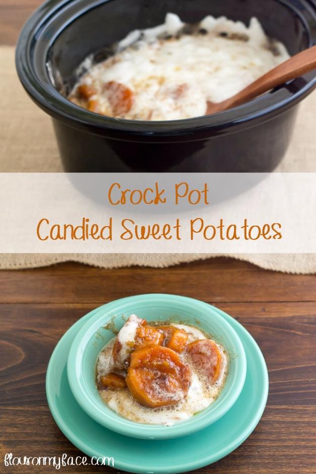 Crockpot candied sweet potatoes in a syrupy glaze topped with toasted mini marshmallows in a slow cooker