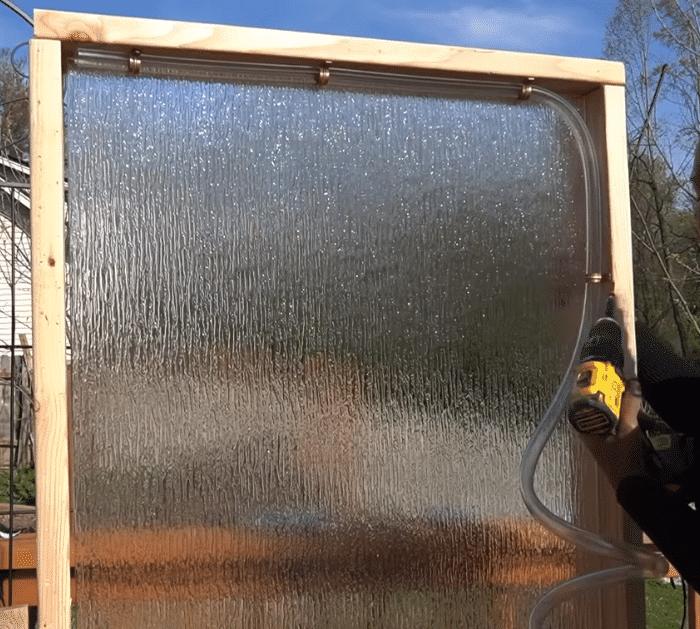 Outdoor Water Wall DIY Using an Old Shower Door Tutorial