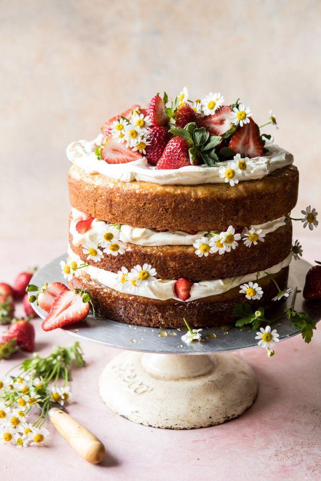 Naked cake with chamomile layers, mascarpone cream and fresh strawberries spilling down the sides recipe for a celebration