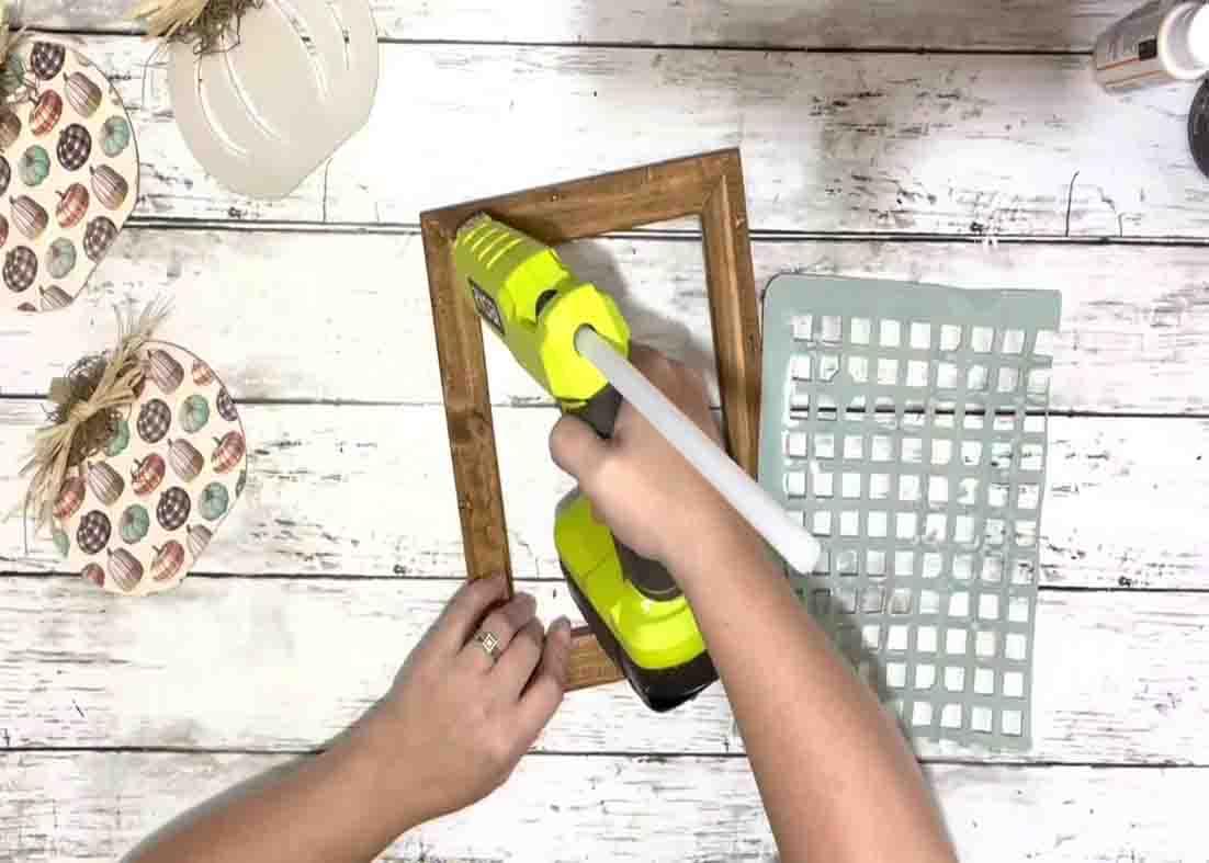 Gluing the sink mats to the frames