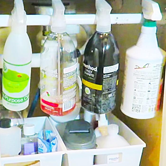 Easy Way To Organize Under The Sink Using A Tension Rod - Cleaning Hacks - Organize Under The Sink
